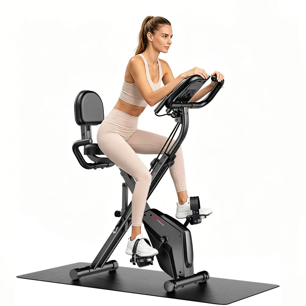 Woman pedalling a foldable X-frame exercise bike with a backrest (retailer image)
